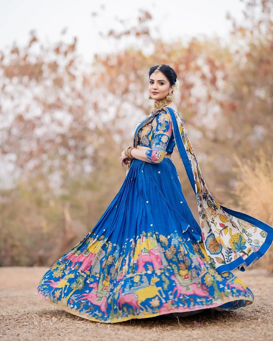 Indian TV Actress Sreemukhi Pics in Blue Lehenga Choli